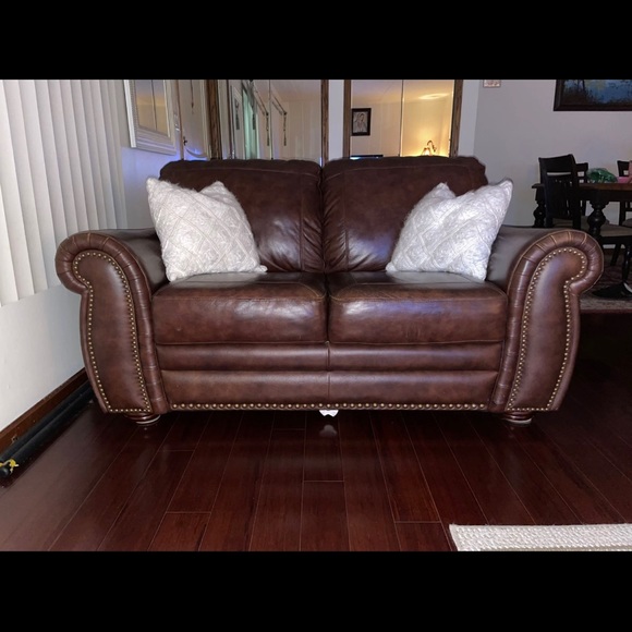 Boho chic leather couch, fits 2 people comfortably. - Picture 1 of 4
